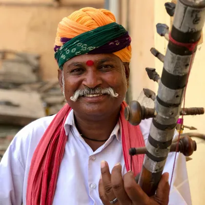 Luxury Rajasthan cultural experience featuring traditional music, dance and royal heritage
